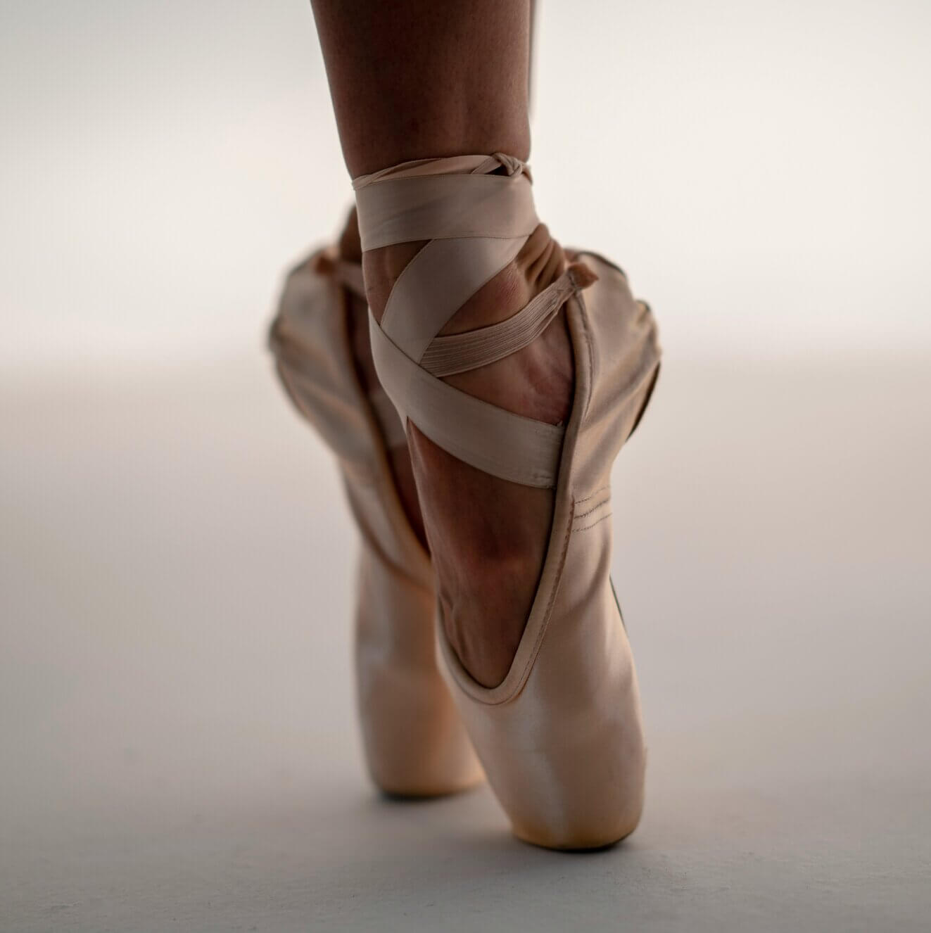 Ballet dancer's feet, on toes.